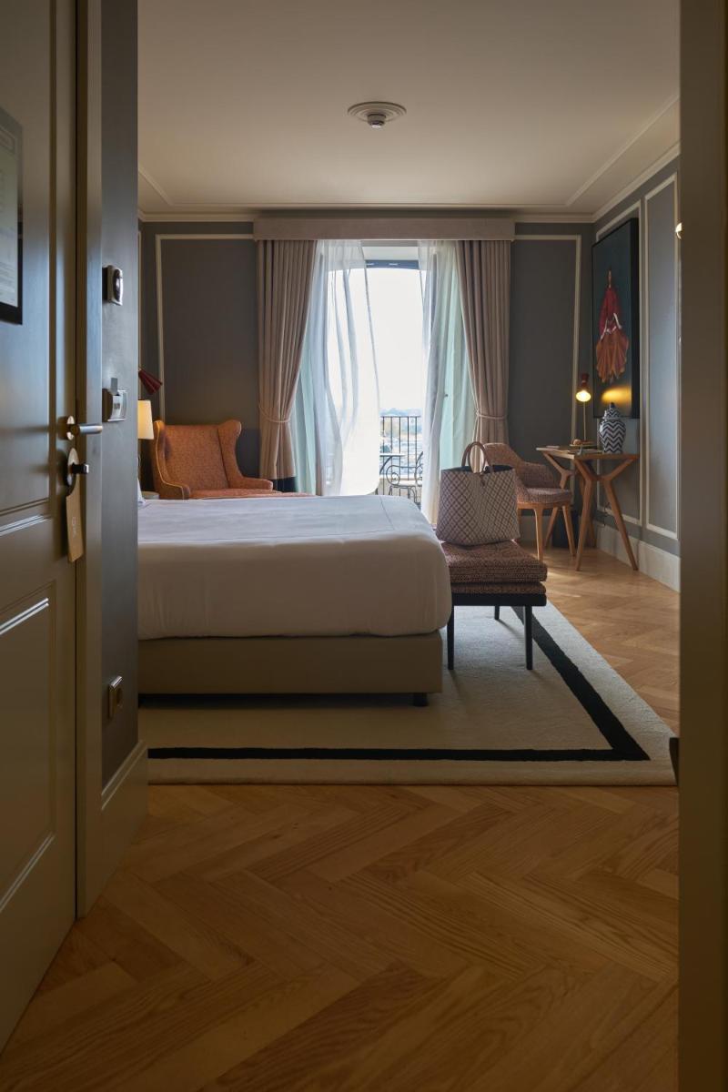 Uma cama ou camas num quarto em GA Palace Hotel & Spa, a XIXth-Century Villa