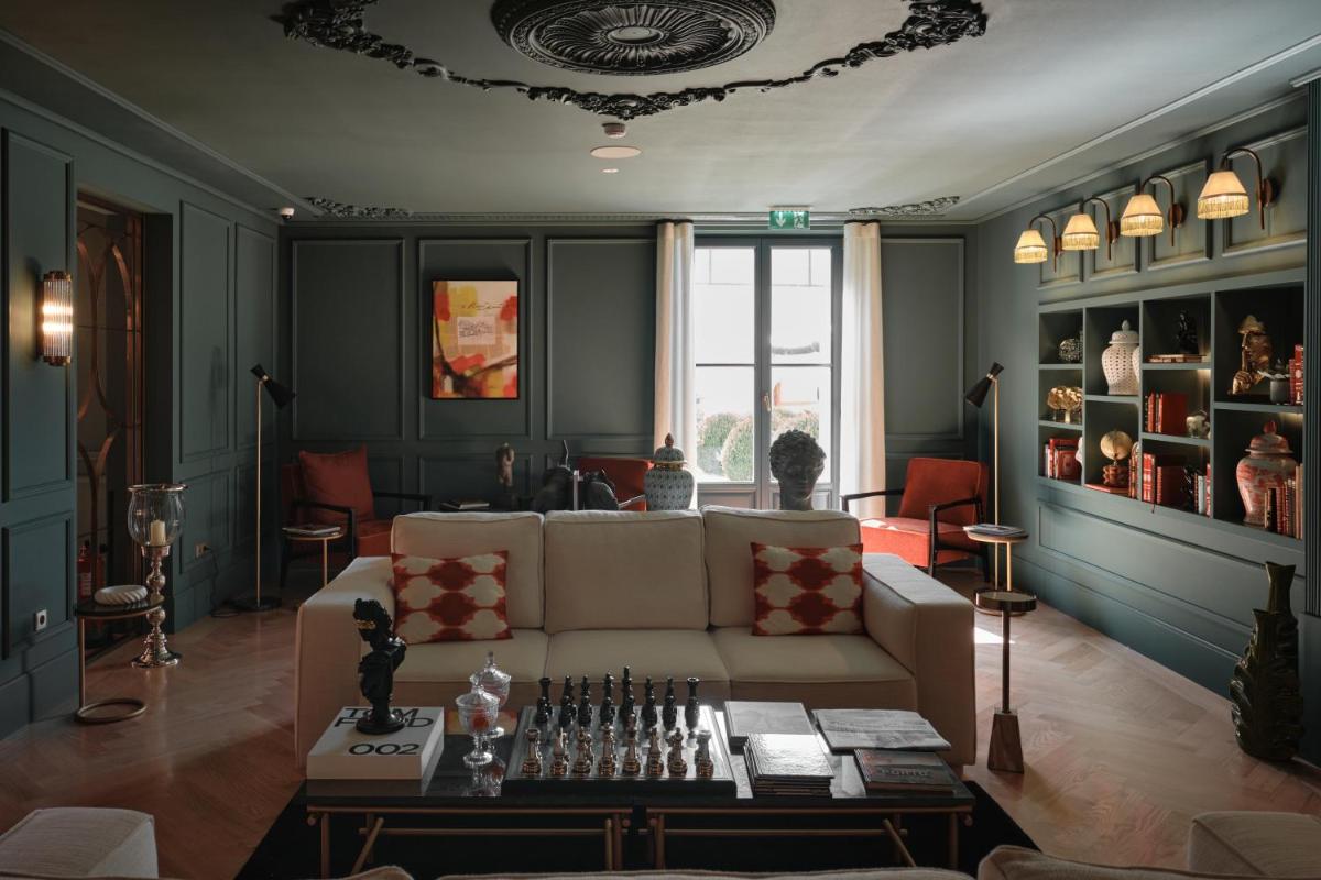 Uma área de estar em GA Palace Hotel & Spa, a XIXth-Century Villa