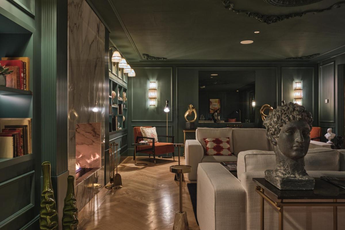 Uma área de estar em GA Palace Hotel & Spa, a XIXth-Century Villa