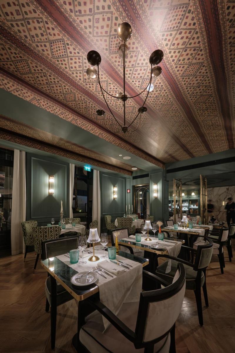 Uma área de estar em GA Palace Hotel & Spa, a XIXth-Century Villa