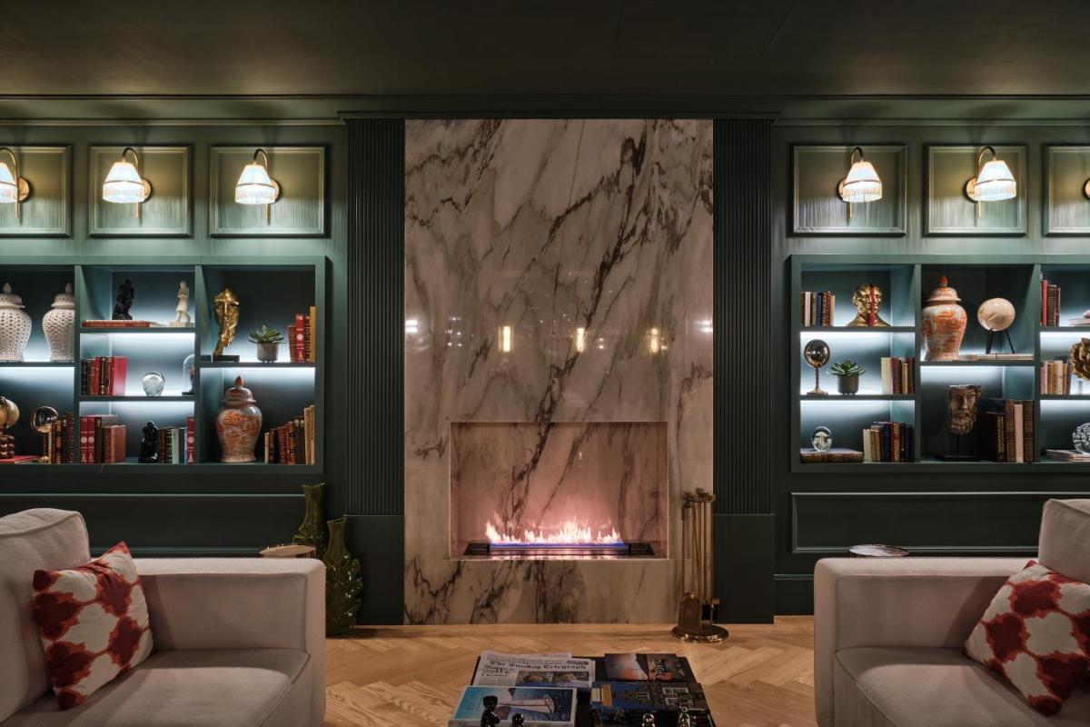 Uma área de estar em GA Palace Hotel & Spa, a XIXth-Century Villa