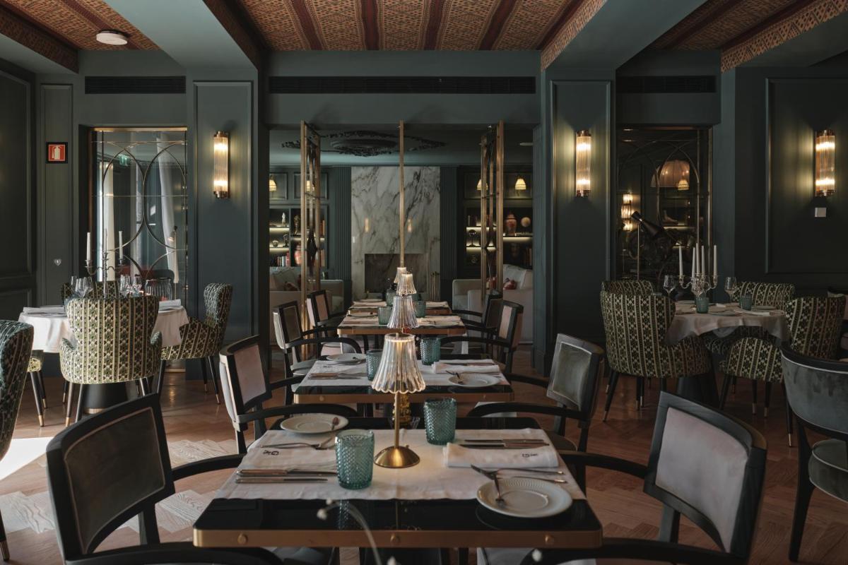 Uma área de estar em GA Palace Hotel & Spa, a XIXth-Century Villa
