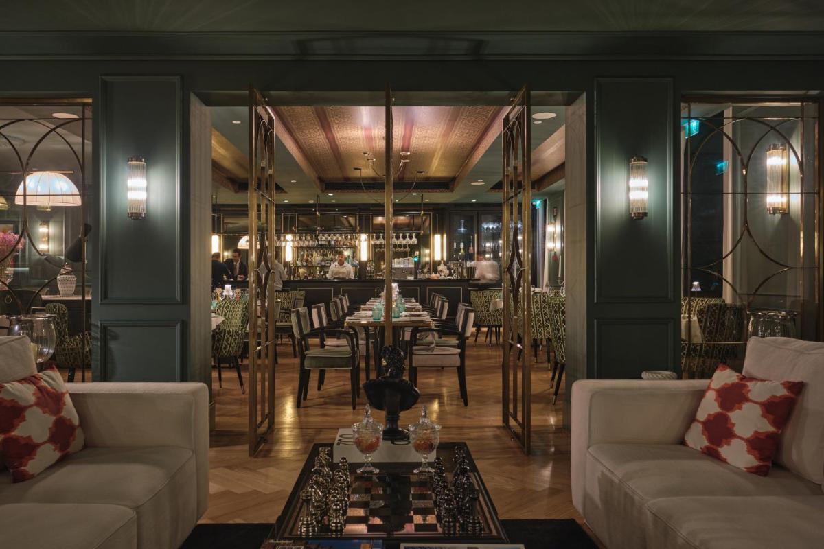 Uma área de estar em GA Palace Hotel & Spa, a XIXth-Century Villa