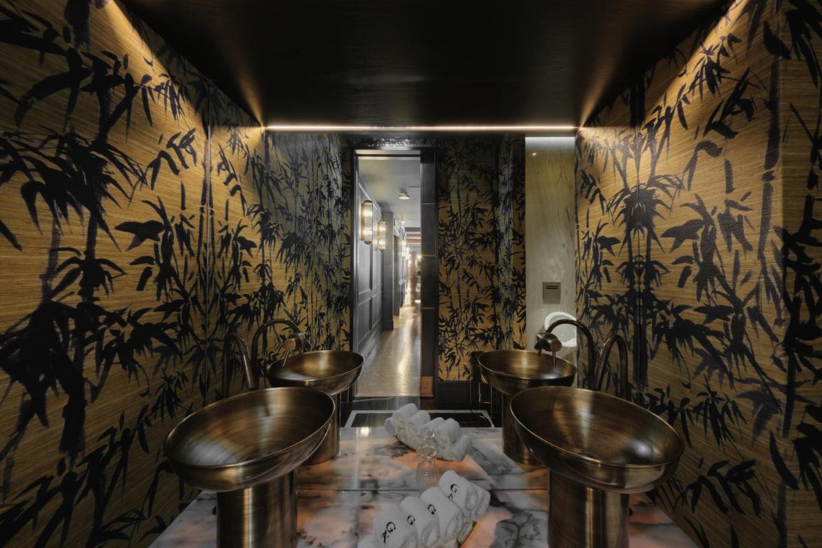 Uma área de estar em GA Palace Hotel & Spa, a XIXth-Century Villa