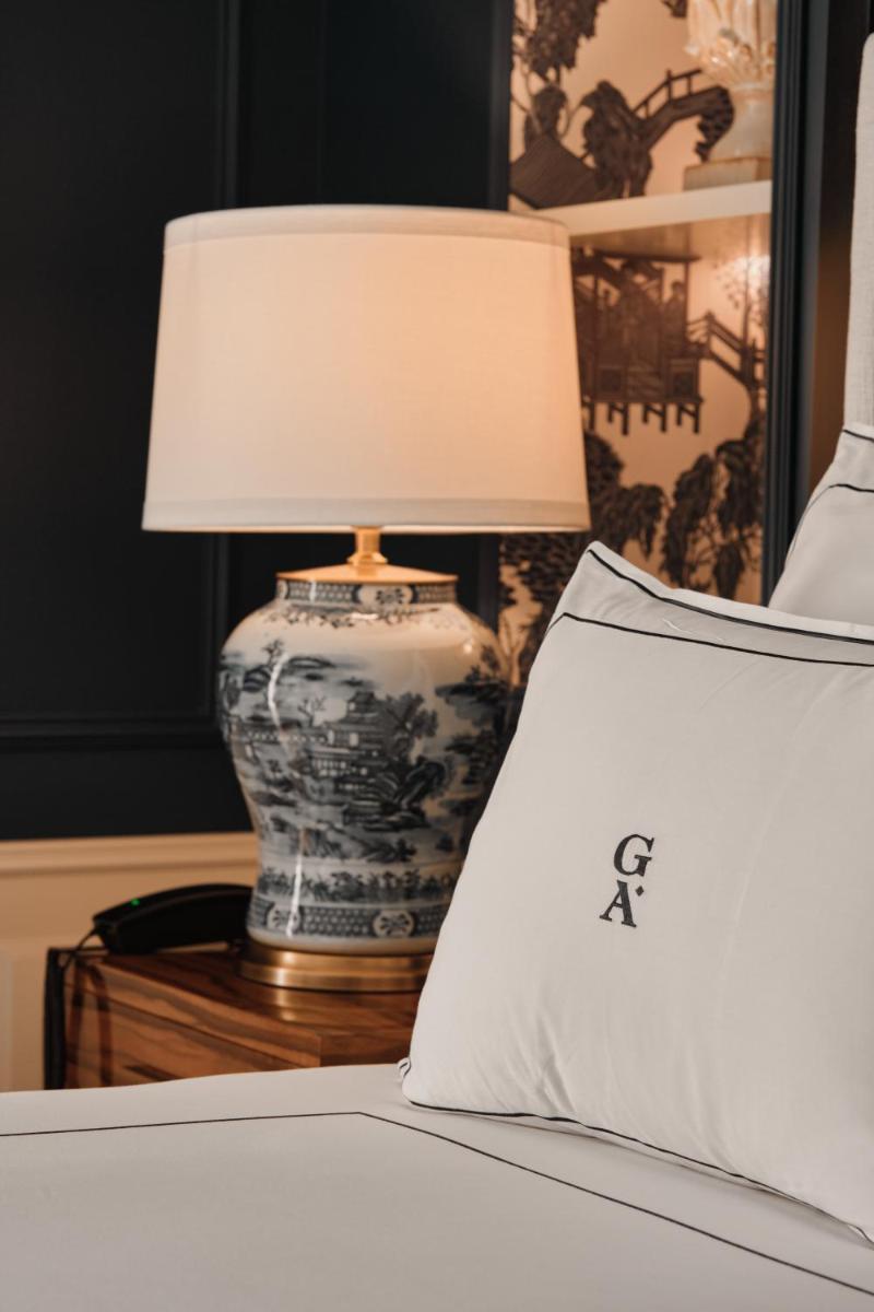 Uma área de estar em GA Palace Hotel & Spa, a XIXth-Century Villa