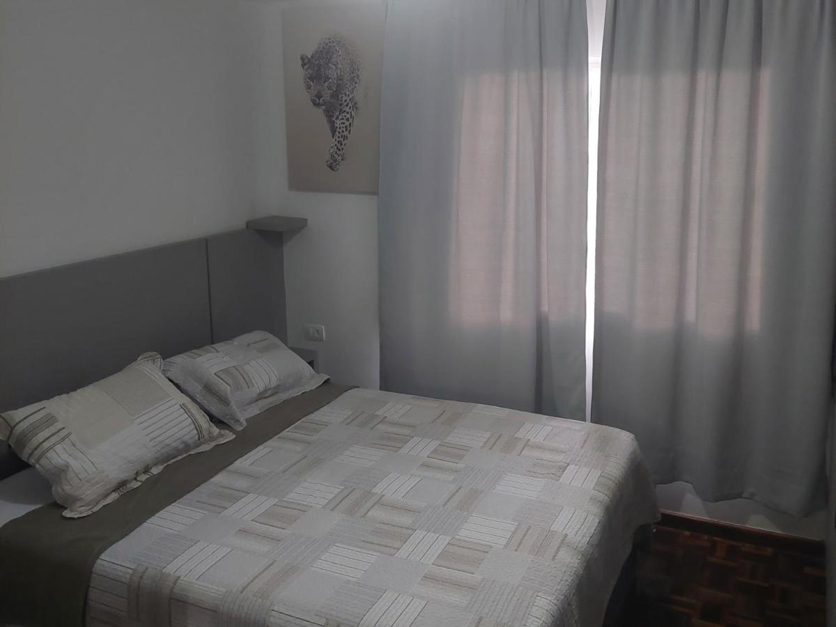 Casa com garagem em condomínio - Housity
