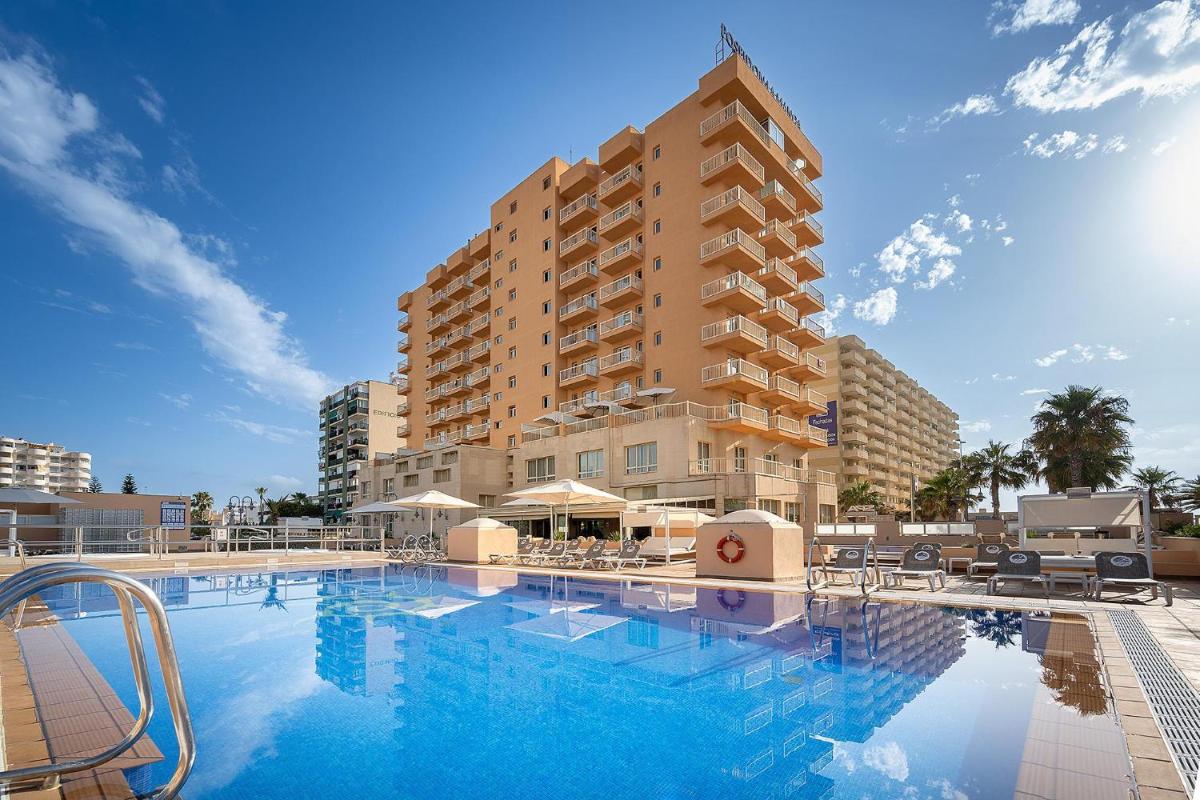 una gran piscina frente a un hotel en Poseidon La Manga Hotel & Spa - Designed for Adults, en La Manga del Mar Menor