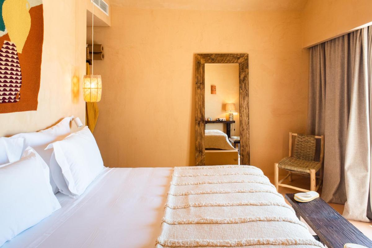 Uma cama ou camas num quarto em Independente Comporta