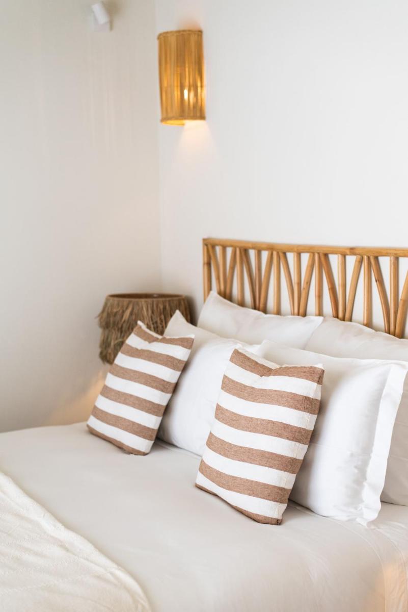 Uma cama ou camas num quarto em Independente Comporta