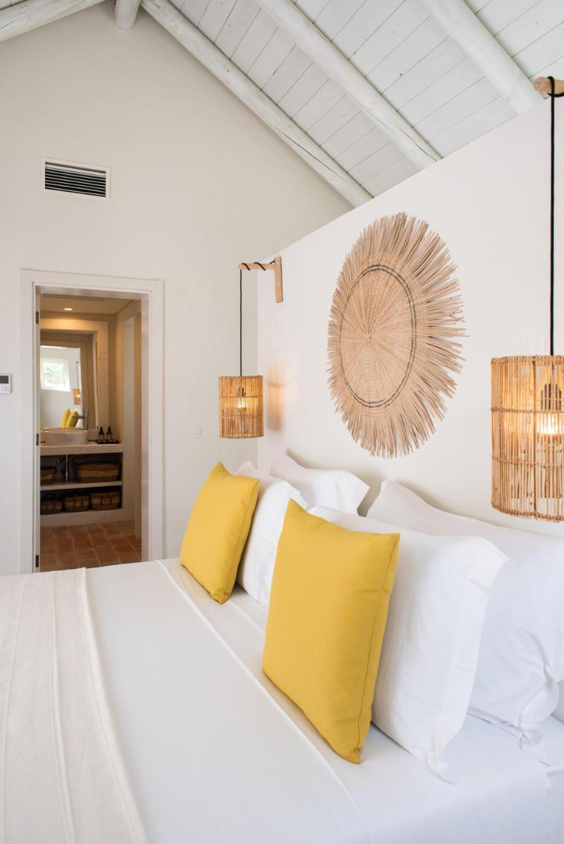 Uma cama ou camas num quarto em Independente Comporta