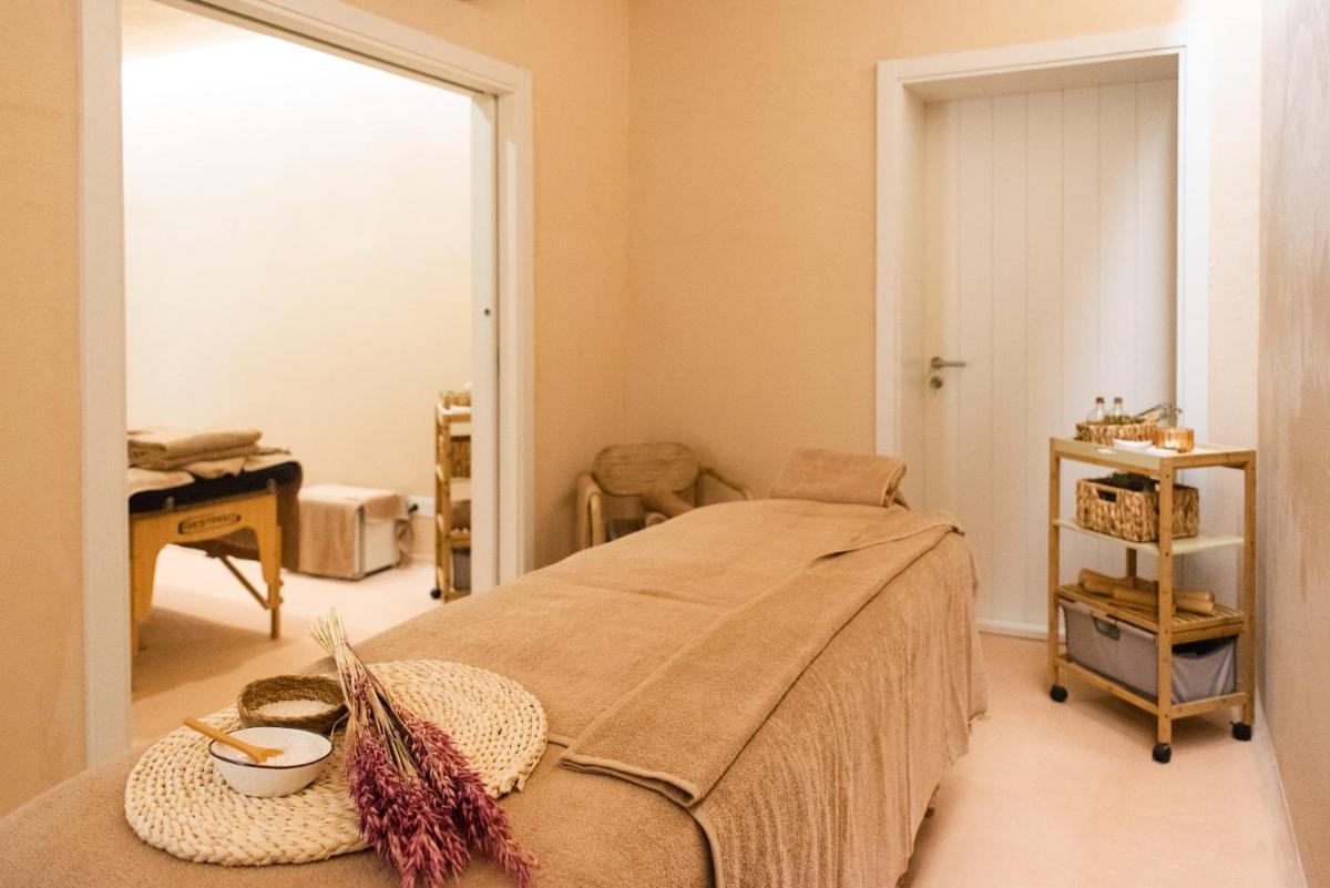 Uma cama ou camas num quarto em Independente Comporta