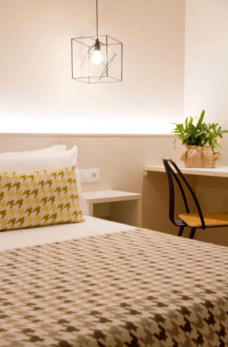 Cama o camas de una habitación en ALEGRIA Plaza Paris 4*Sup