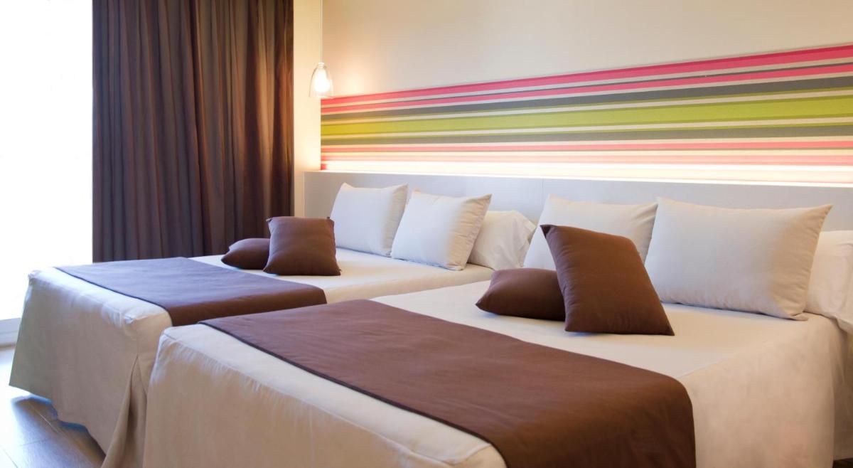 Cama o camas de una habitación en ALEGRIA Plaza Paris 4*Sup