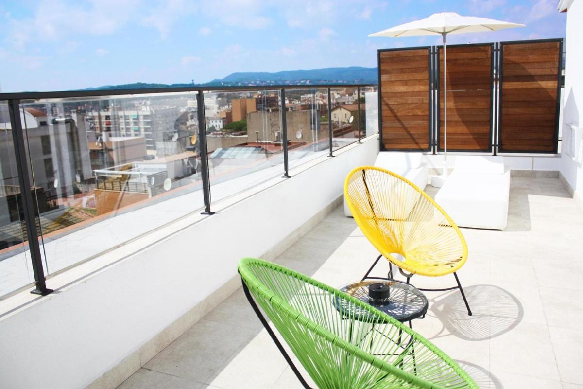 Un balcón o terraza de ALEGRIA Plaza Paris 4*Sup