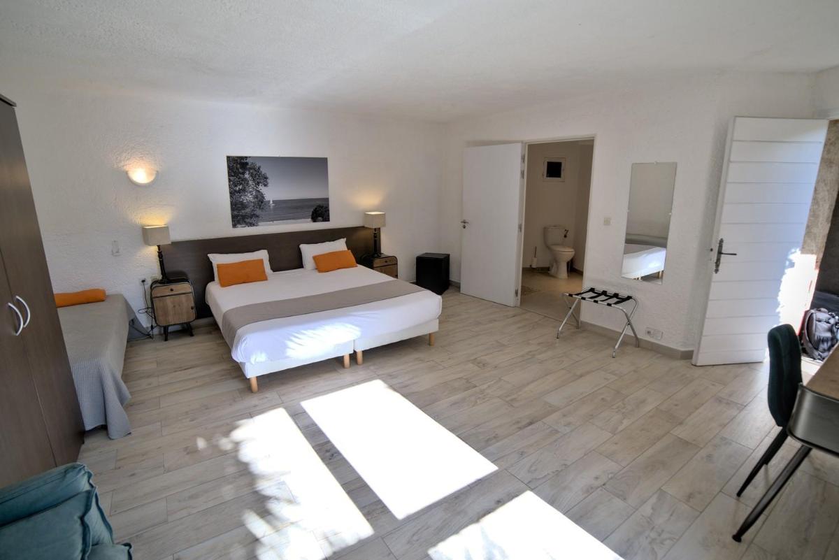 Un ou plusieurs lits dans un hébergement de l'établissement Hôtel Casa Rossa & Spa