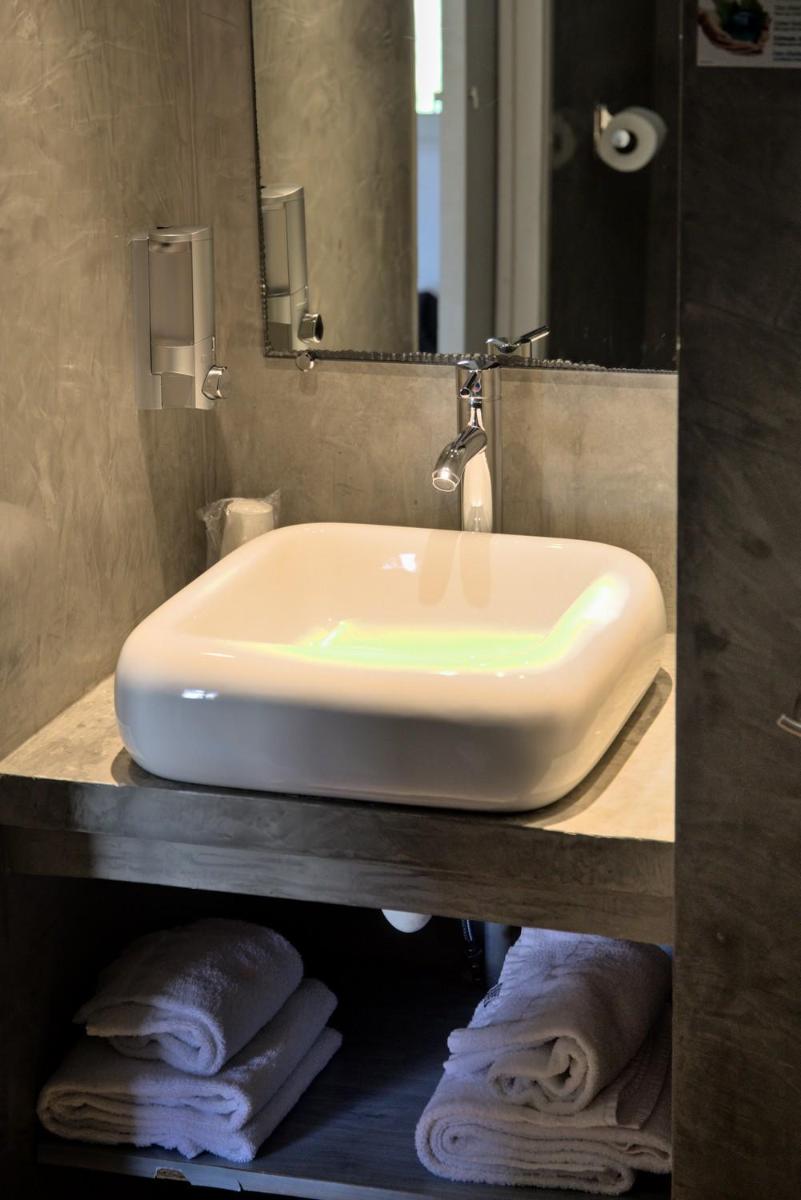 Salle de bains dans l'établissement Hôtel Casa Rossa & Spa