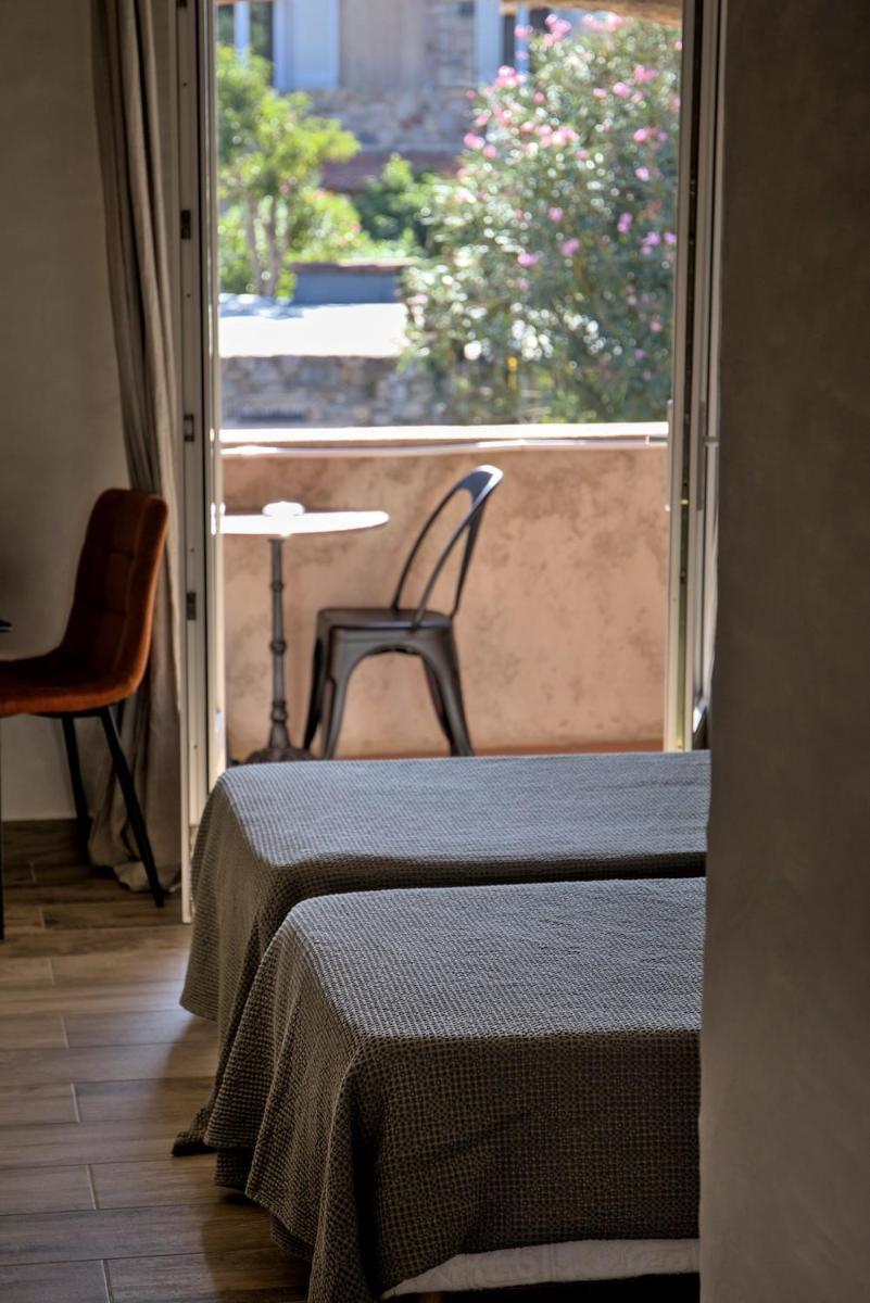 Un ou plusieurs lits dans un hébergement de l'établissement Hôtel Casa Rossa & Spa