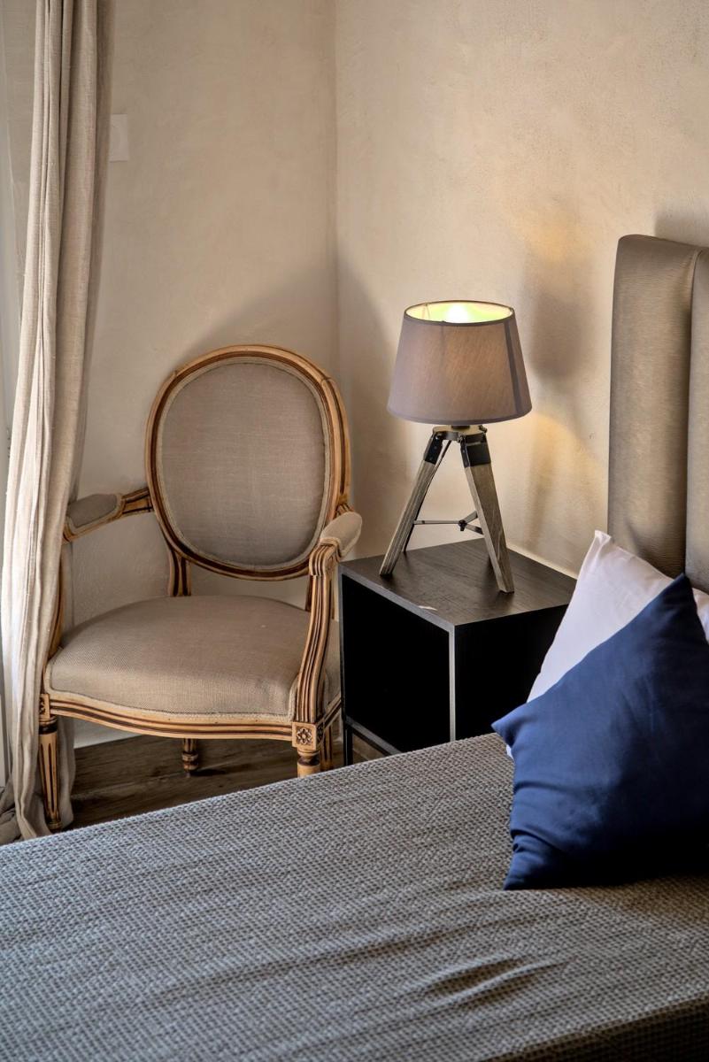 Un ou plusieurs lits dans un hébergement de l'établissement Hôtel Casa Rossa & Spa