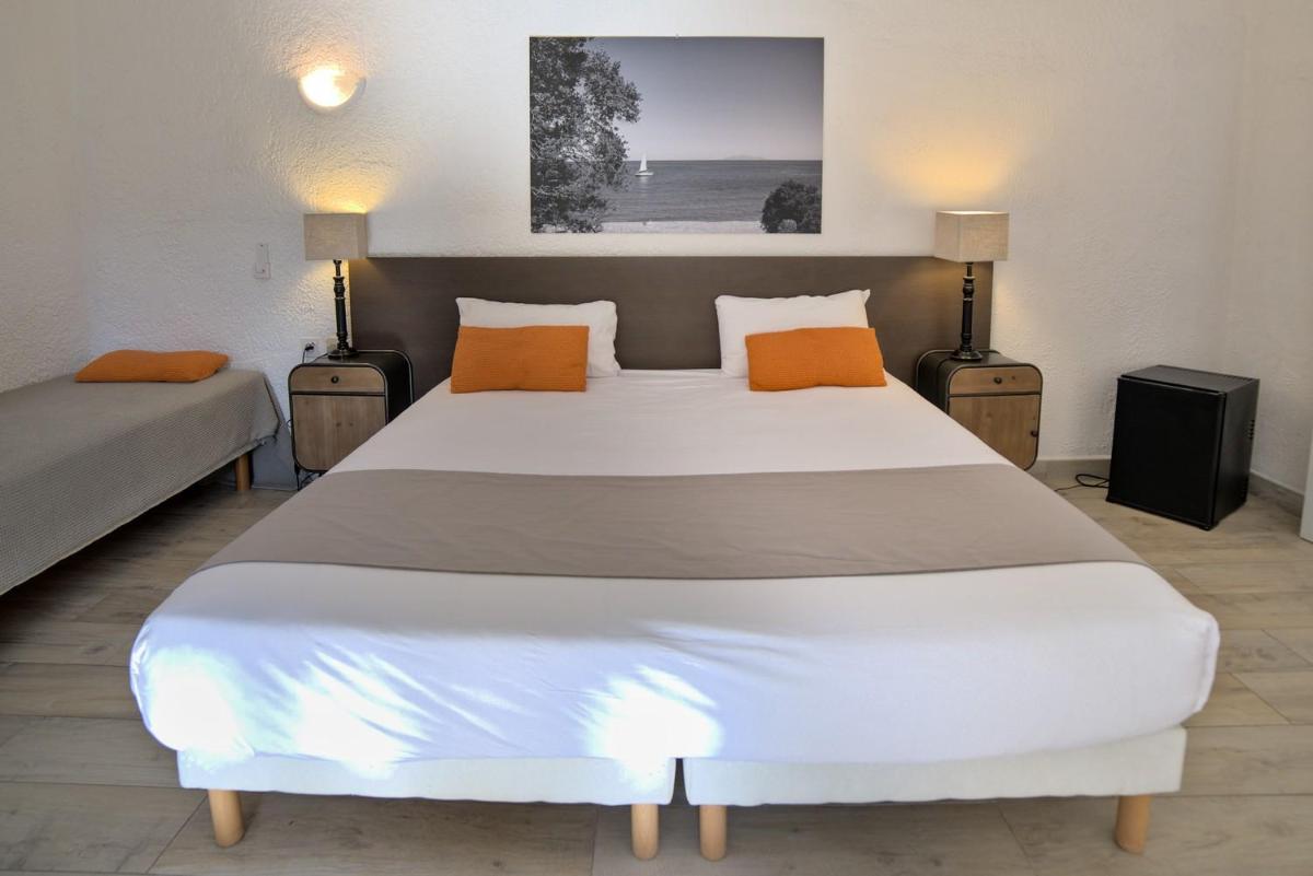 Un ou plusieurs lits dans un hébergement de l'établissement Hôtel Casa Rossa & Spa
