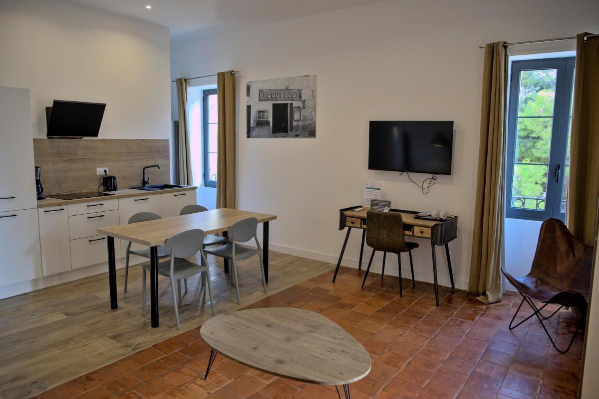 Cuisine ou kitchenette dans l'établissement Hôtel Casa Rossa & Spa