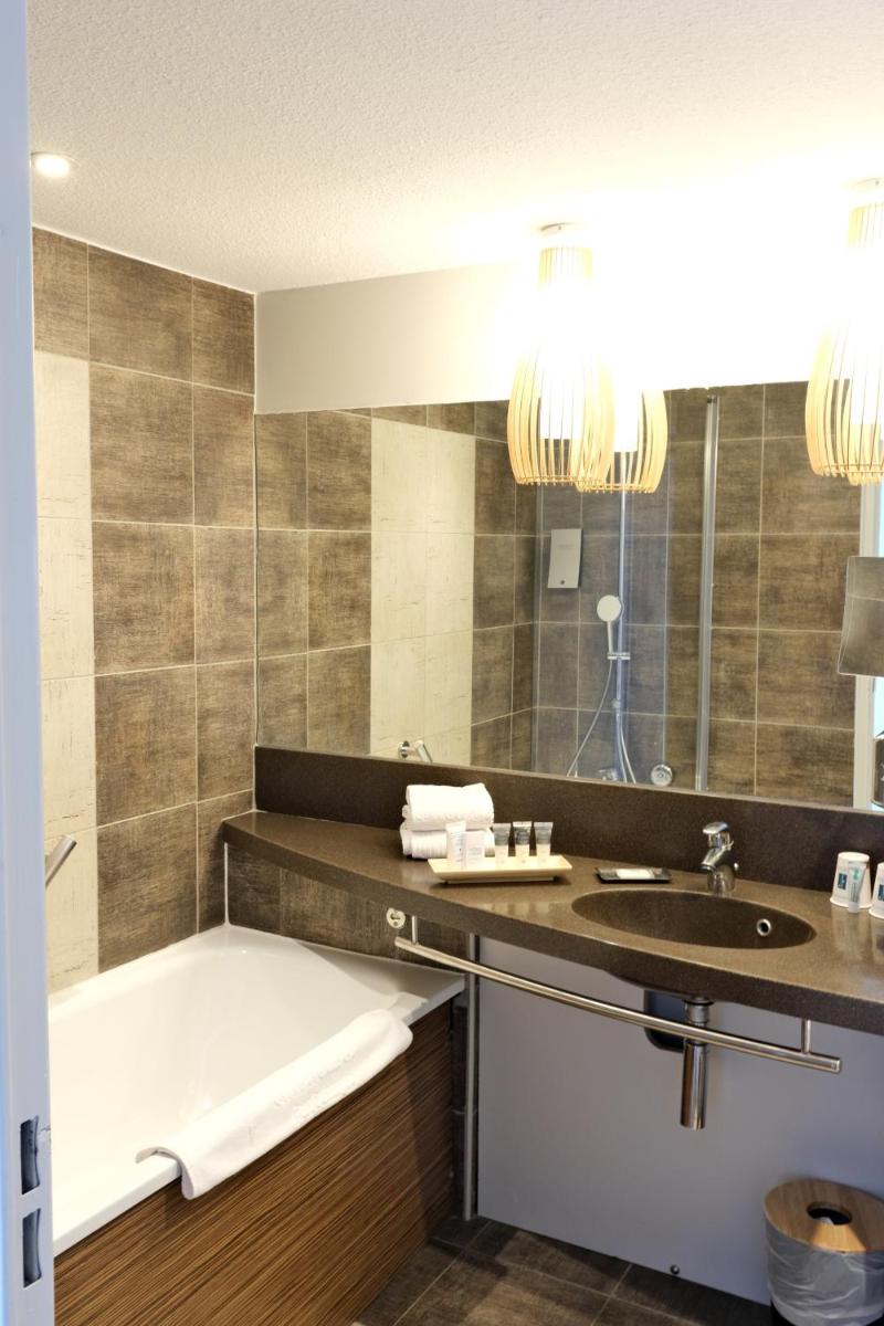 Salle de bains dans l'établissement Thalazur Port-Camargue - Hotel & Spa