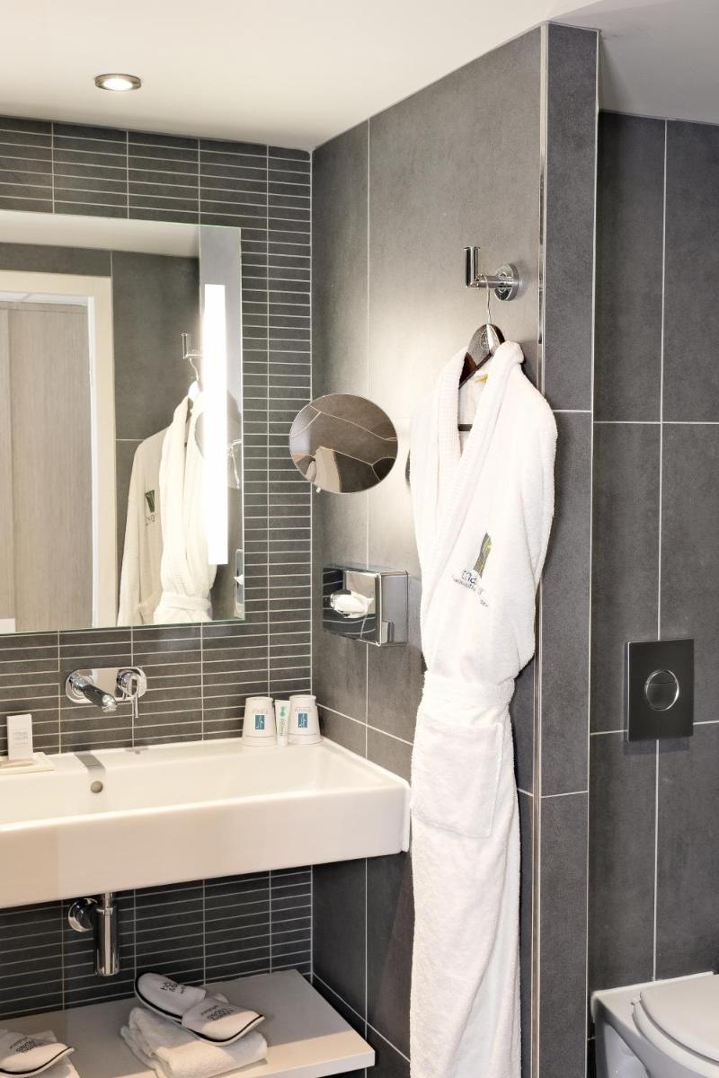Salle de bains dans l'établissement Thalazur Cabourg - Hôtel & Spa