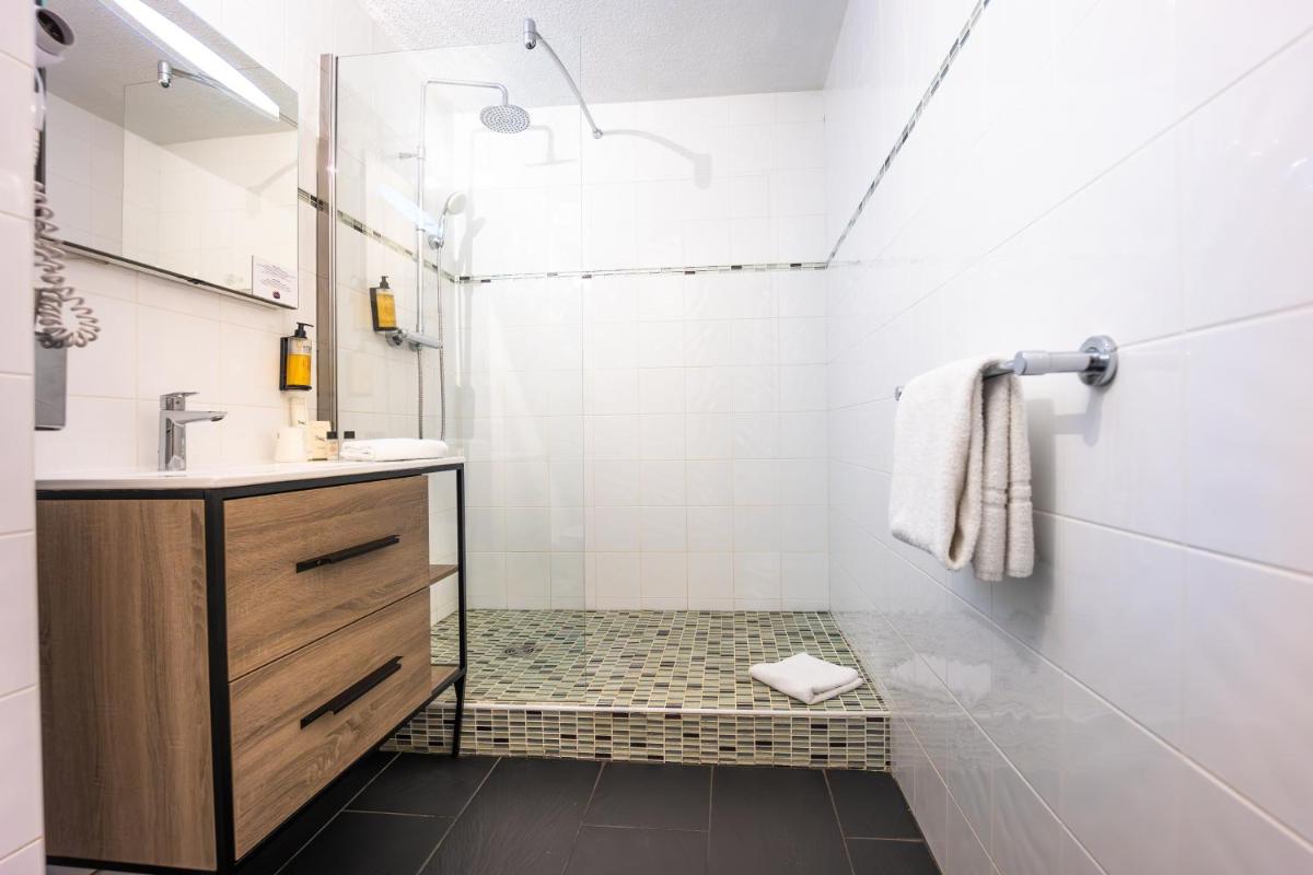 Salle de bains dans l'établissement Le Drip's