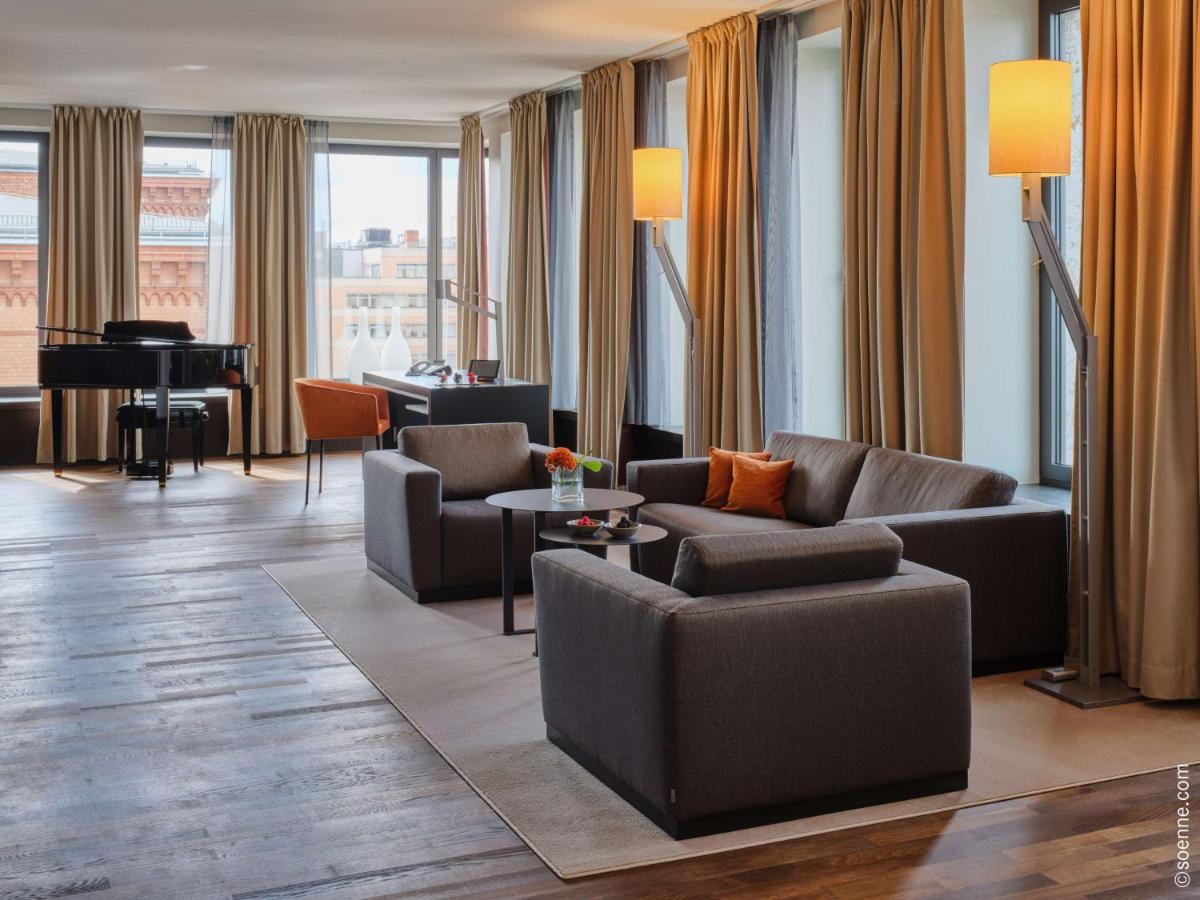 Ein Sitzbereich in der Unterkunft Dorint Kurfürstendamm Berlin Ein Sitzbereich in der Unterkunft Dorint Kurfürstendamm Berlin