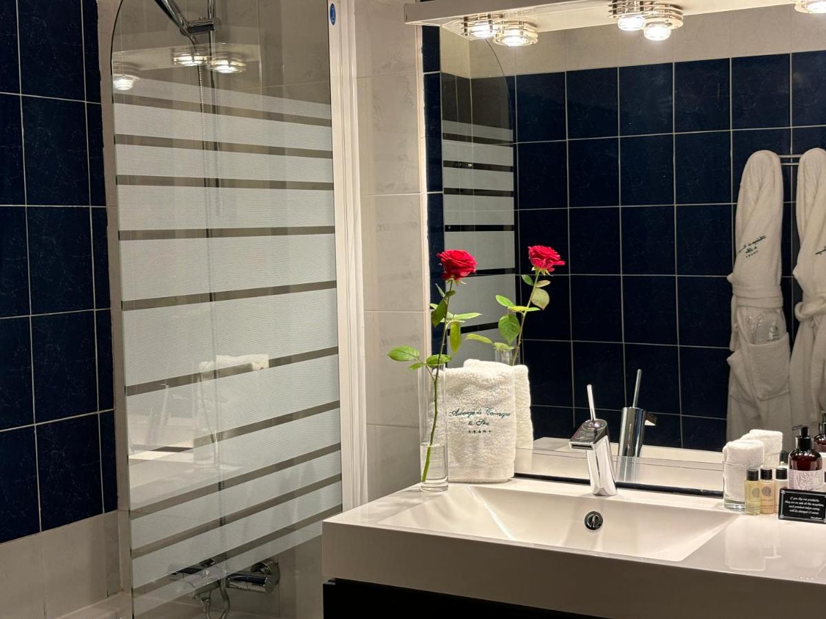 Salle de bains dans l'établissement Auberge de Cassagne & Spa