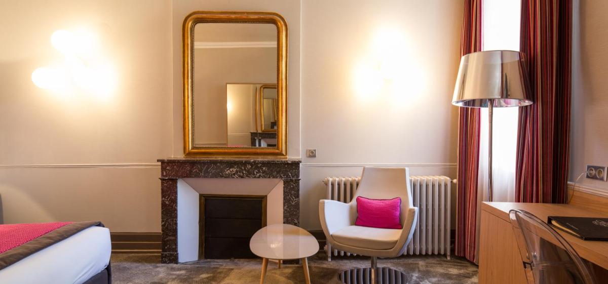 Coin salon dans l'établissement Chapeau Rouge par William Frachot - Hôtel Espace Bien-être & Restaurant étoilé