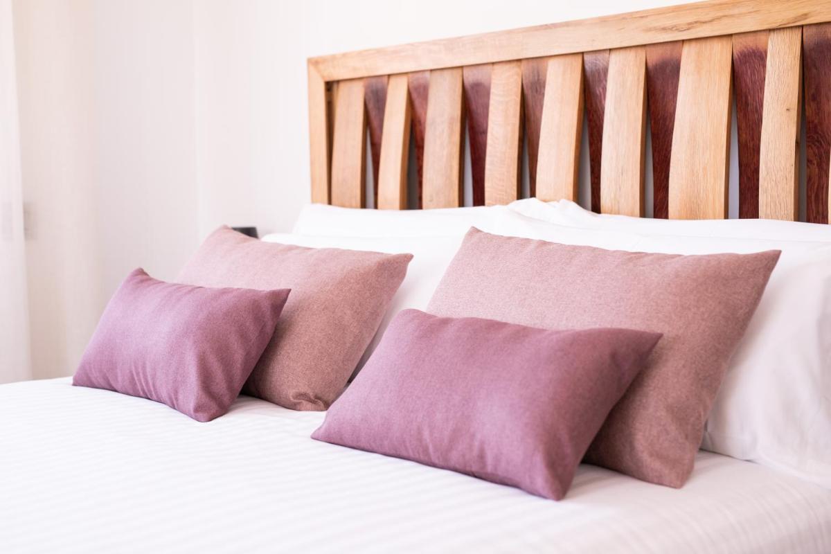 Cama o camas de una habitación en Hotel Spa Viña Real