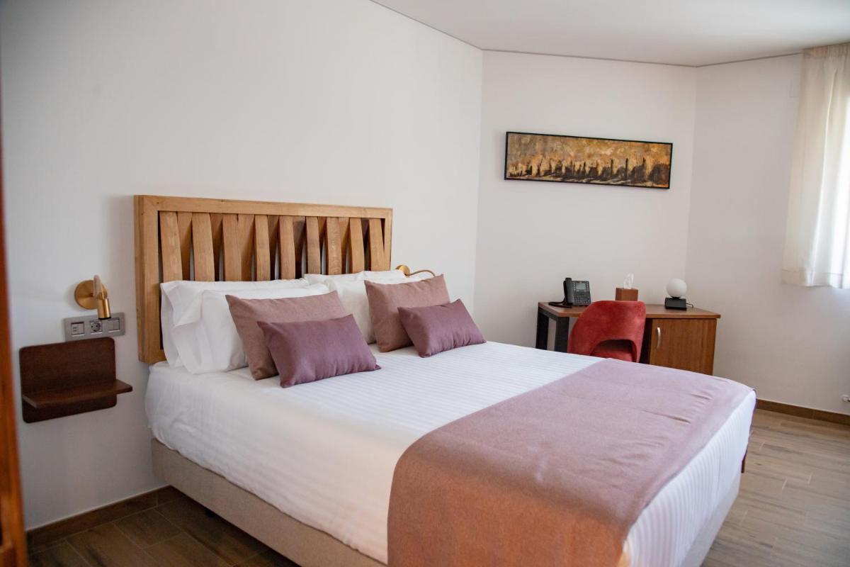 Cama o camas de una habitación en Hotel Spa Viña Real