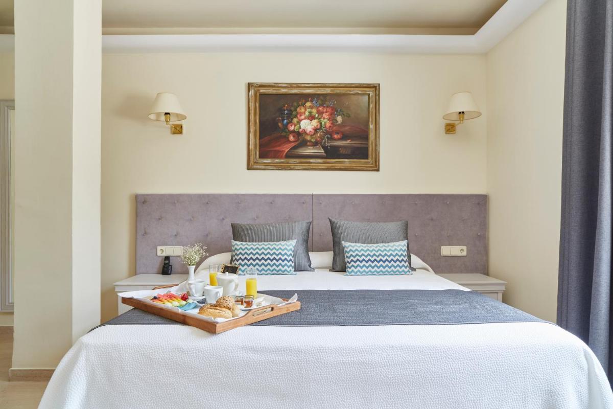 Cama o camas de una habitación en Grand Hotel Palladium Santa Eulalia del Río