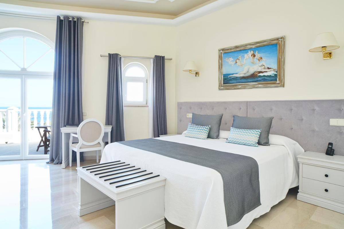 Cama o camas de una habitación en Grand Hotel Palladium Santa Eulalia del Río