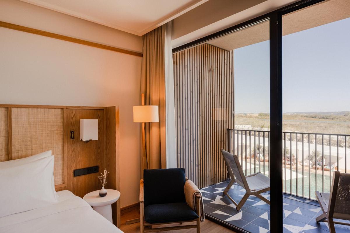 Uma cama ou camas num quarto em Aethos Ericeira