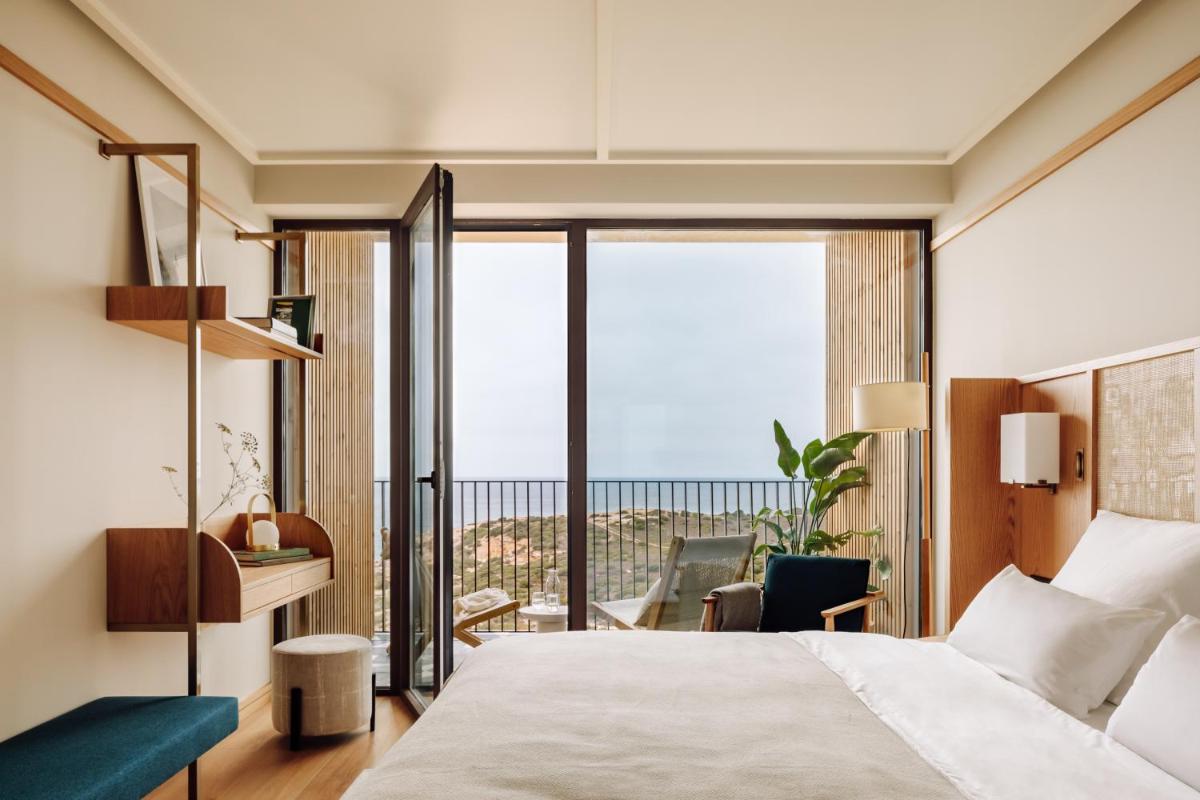 Uma cama ou camas num quarto em Aethos Ericeira