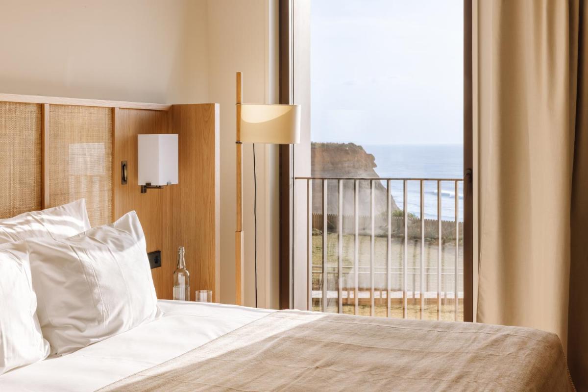 Uma cama ou camas num quarto em Aethos Ericeira