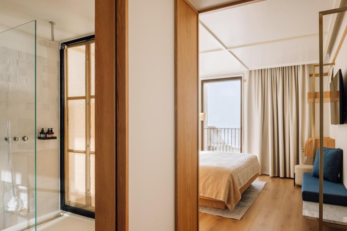 Uma cama ou camas num quarto em Aethos Ericeira