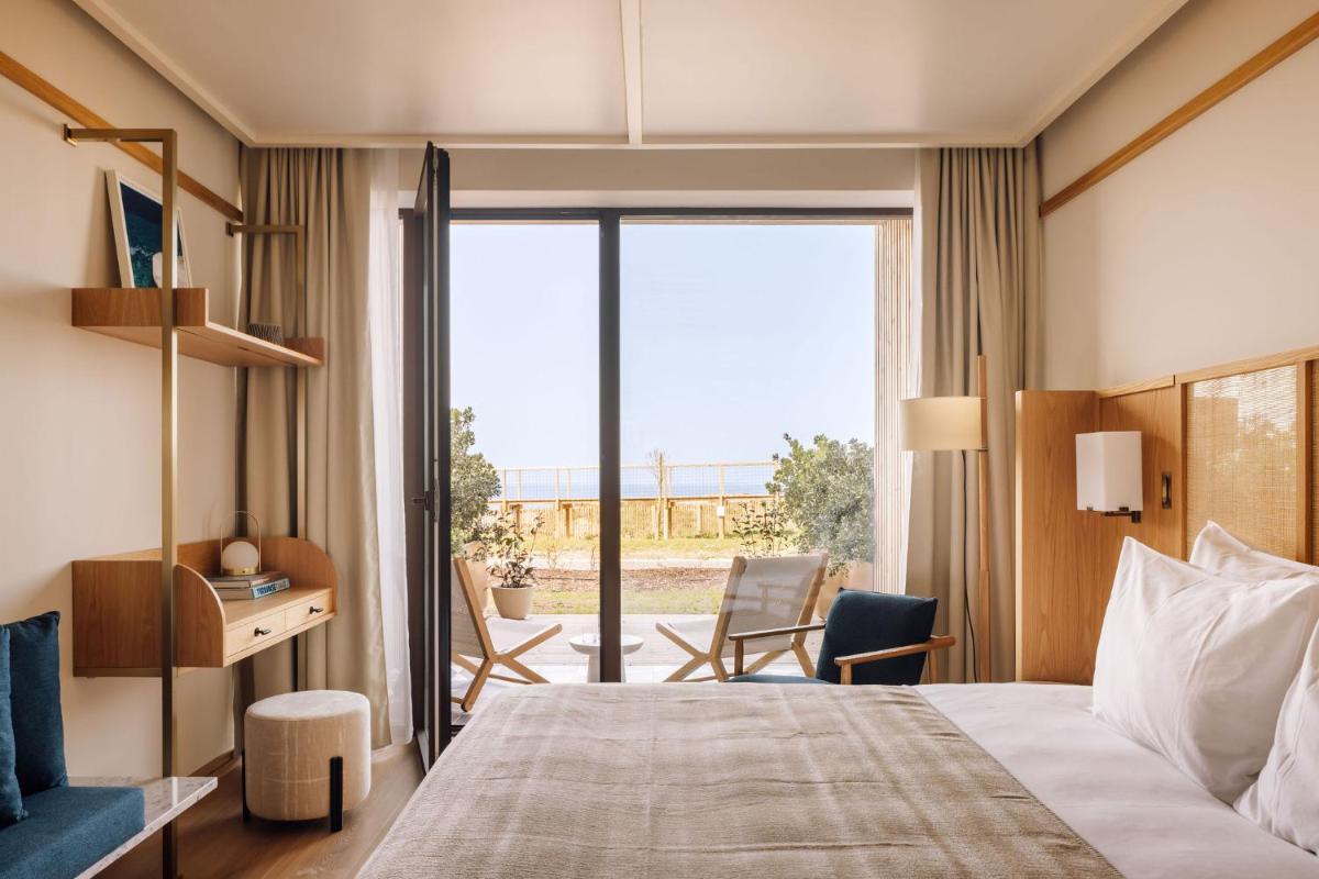 Uma cama ou camas num quarto em Aethos Ericeira