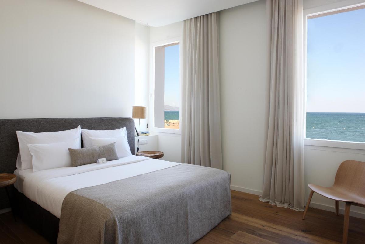 Cama o camas de una habitación en Hostal Empúries