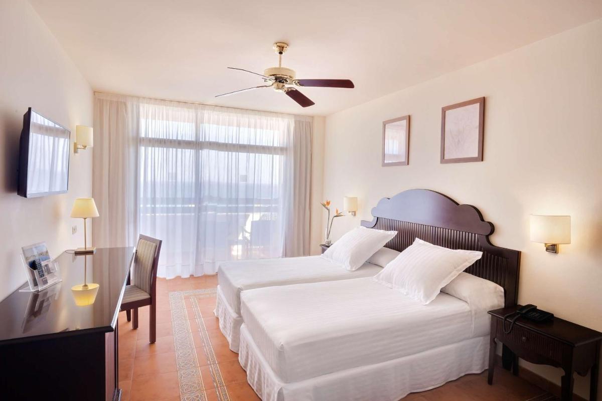 Cama o camas de una habitación en Occidental Jandía Mar
