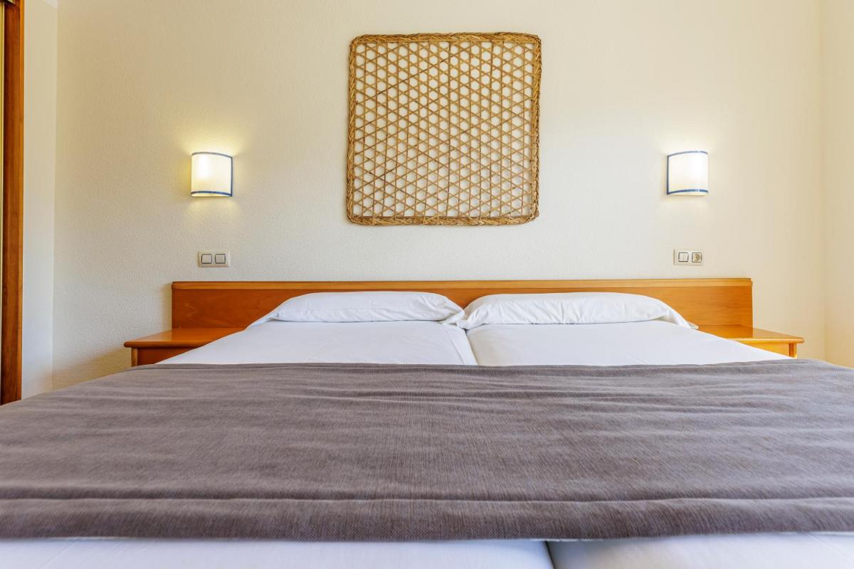 Cama o camas de una habitación en Hotel Eden Nord Soller