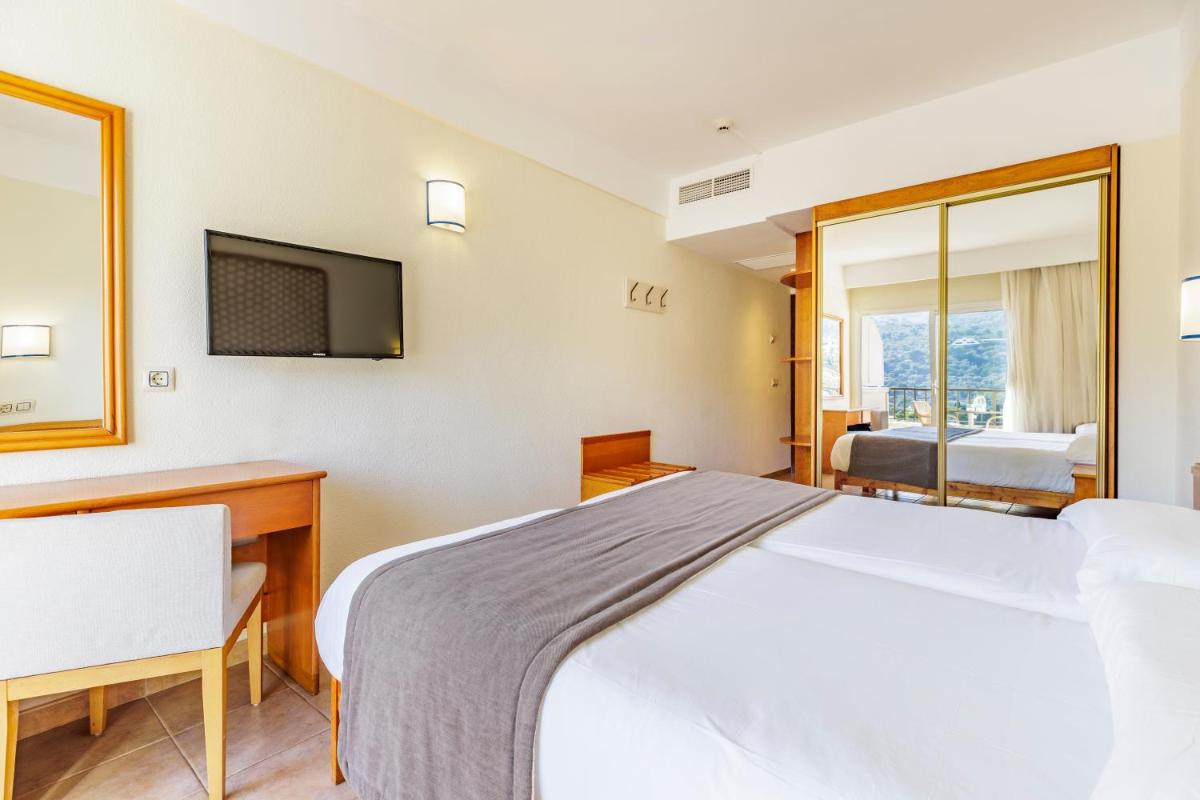 Cama o camas de una habitación en Hotel Eden Nord Soller