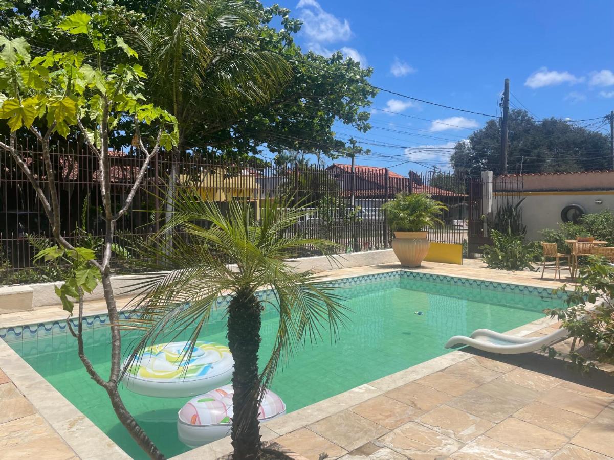 Suíte com varanda vista piscina - Housity