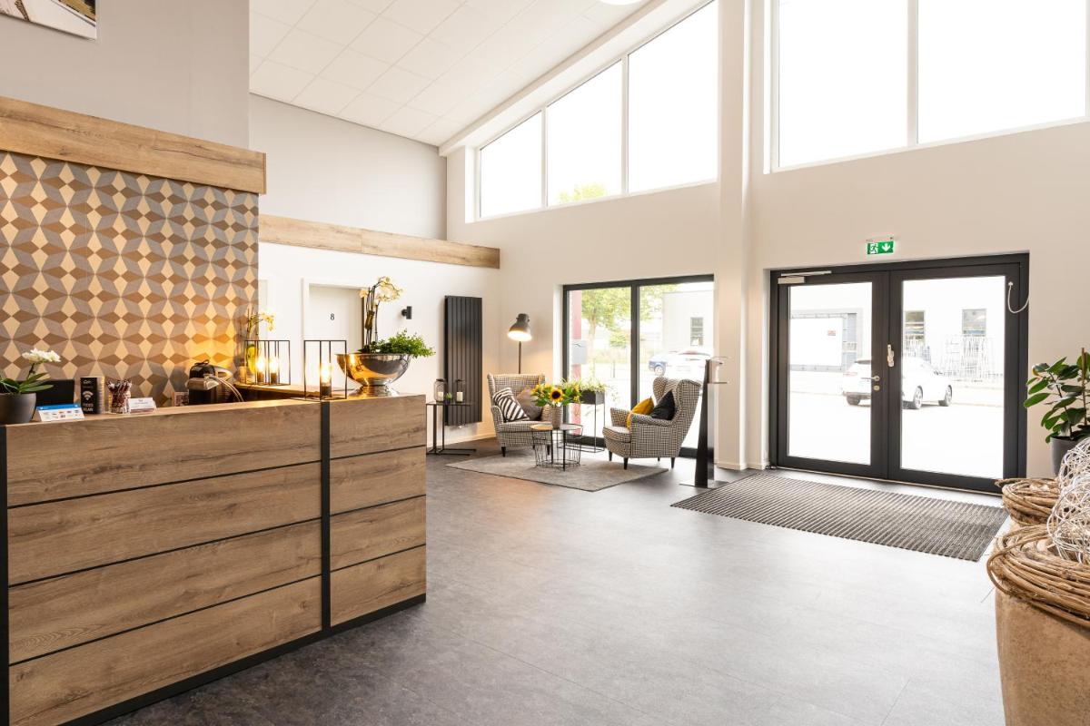 Ein Sitzbereich in der Unterkunft Motel Hasetal