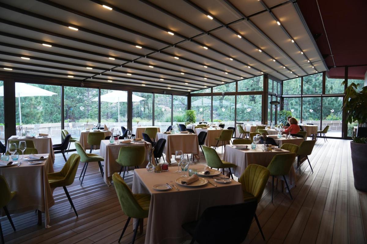 Un restaurante o sitio para comer en Hotel Spa Villalba
