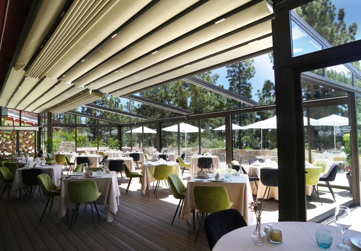 Un restaurante o sitio para comer en Hotel Spa Villalba