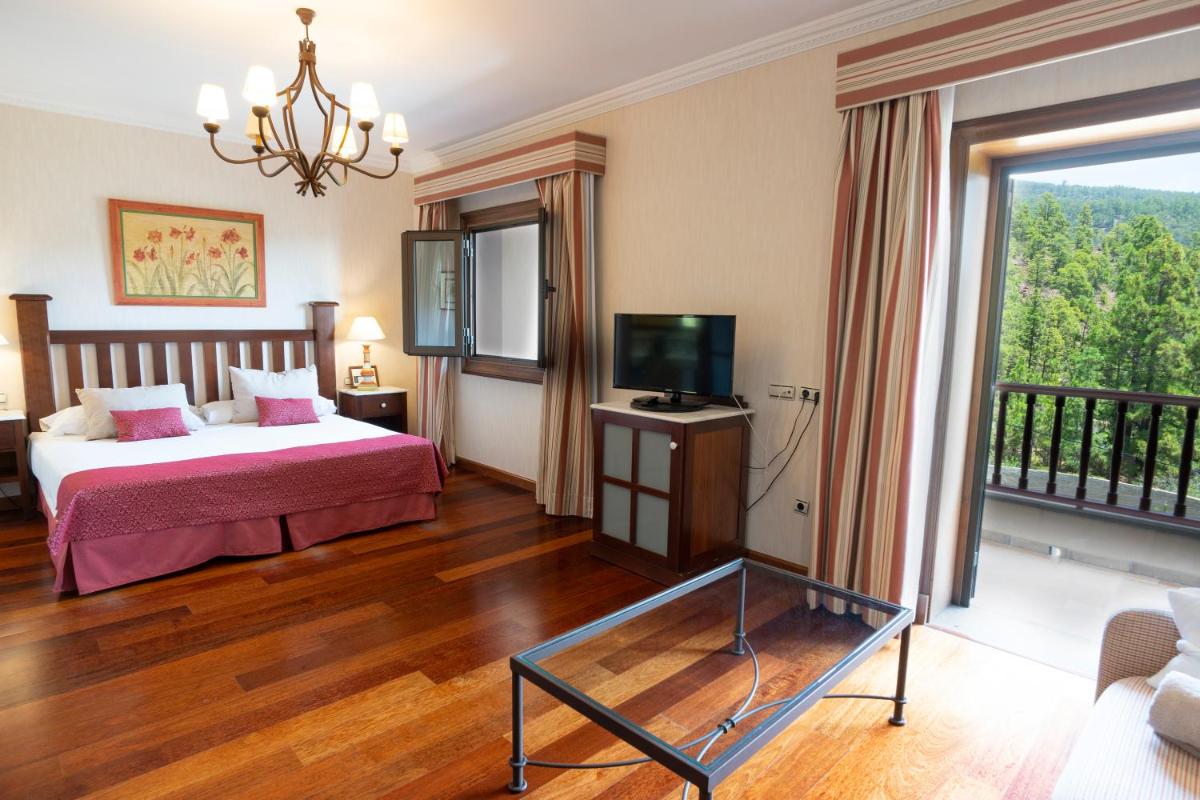 Cama o camas de una habitación en Hotel Spa Villalba