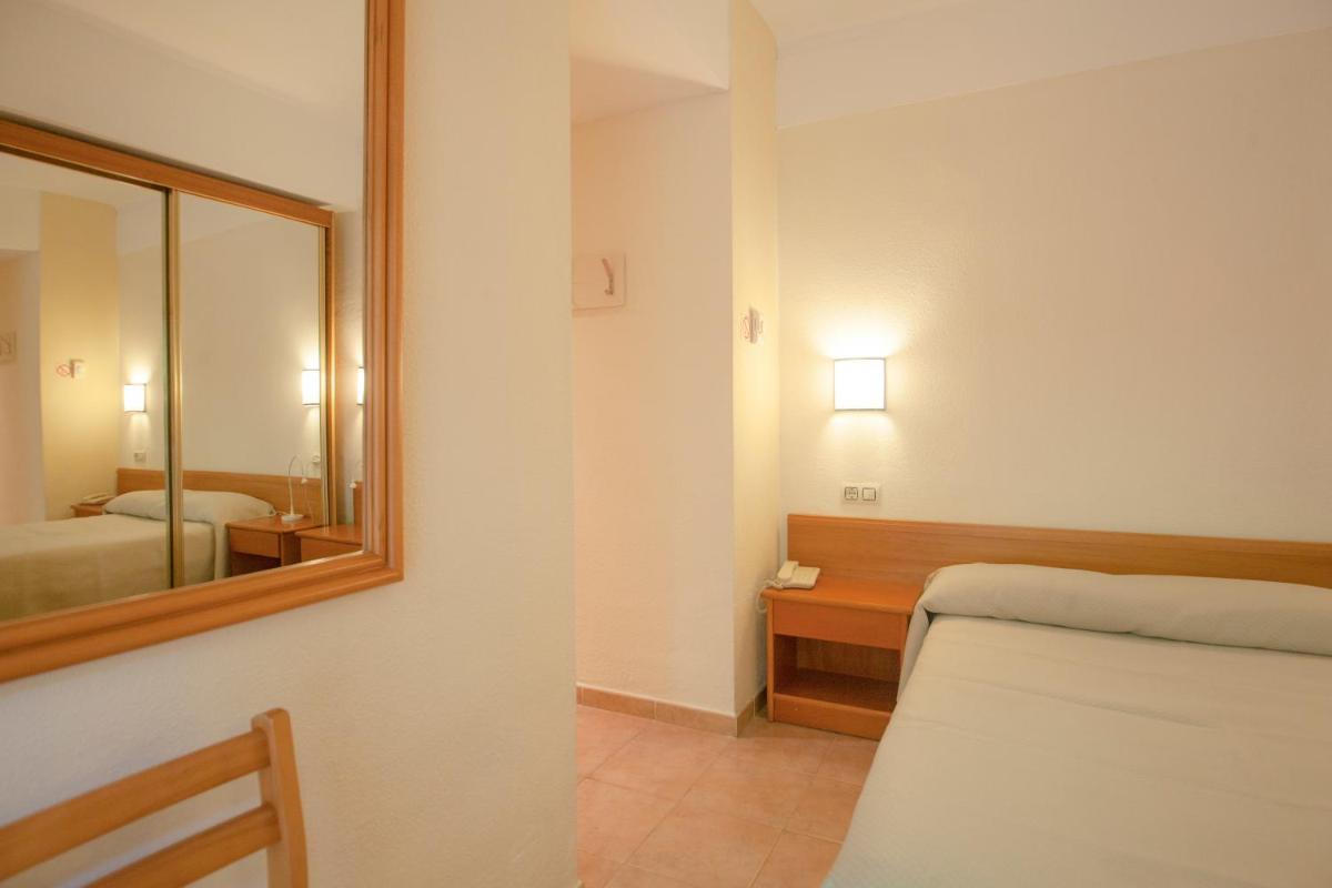 Cama o camas de una habitación en Hotel Eden Nord Soller