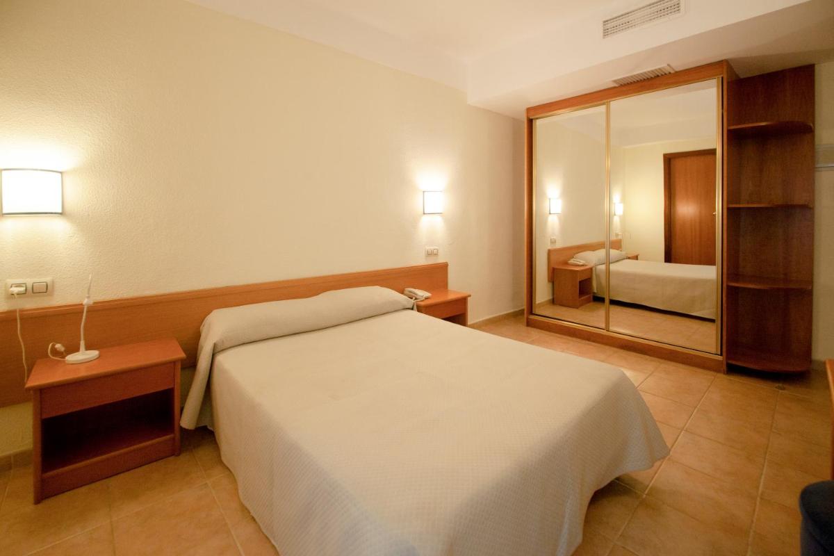 Cama o camas de una habitación en Hotel Eden Nord Soller